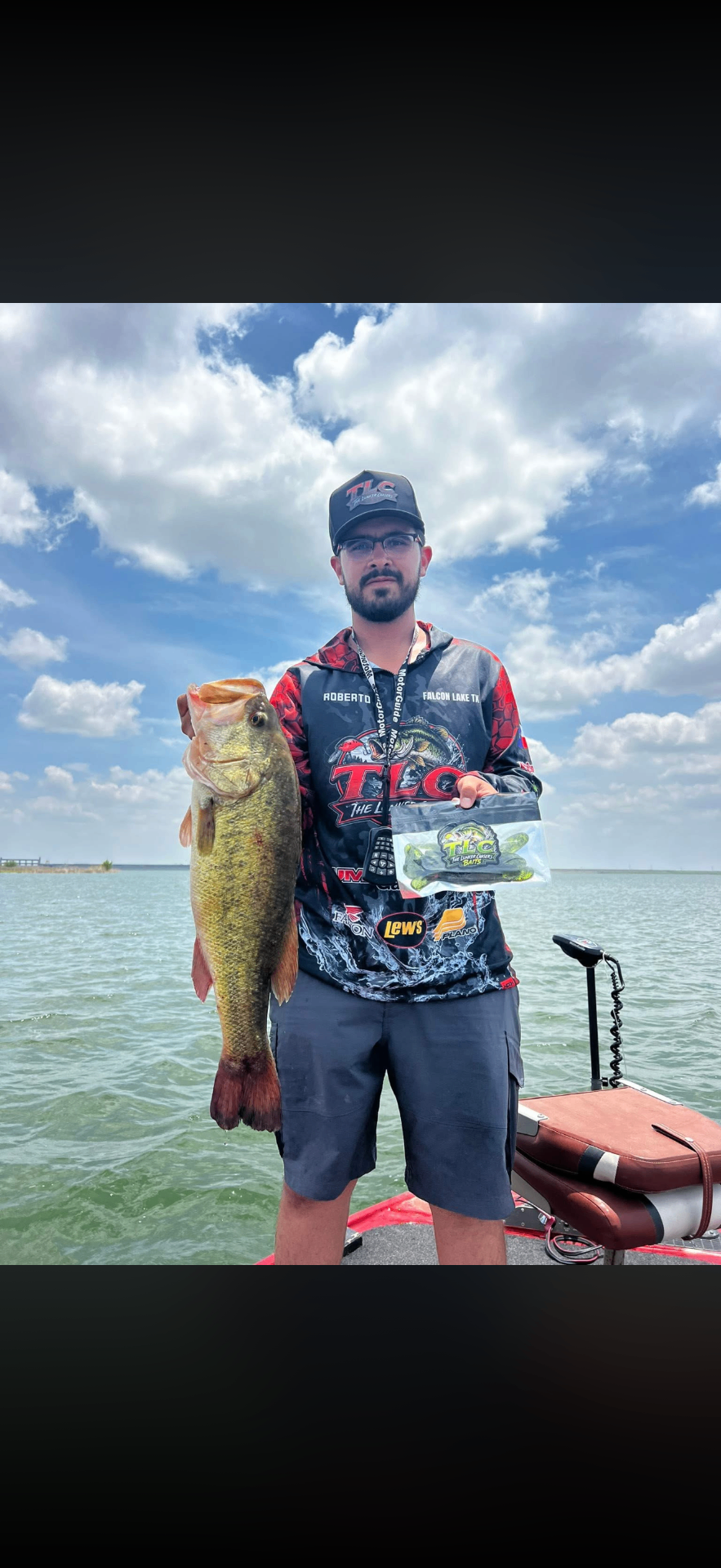Roberto holding the 7 lb big bass winner