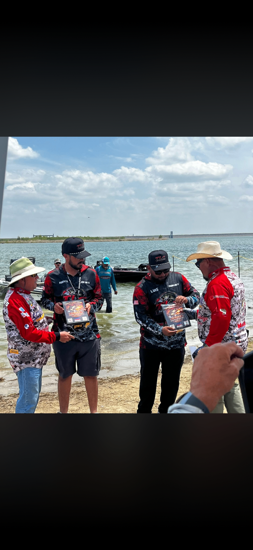 The Lunker Chaser's receiving the tournament award